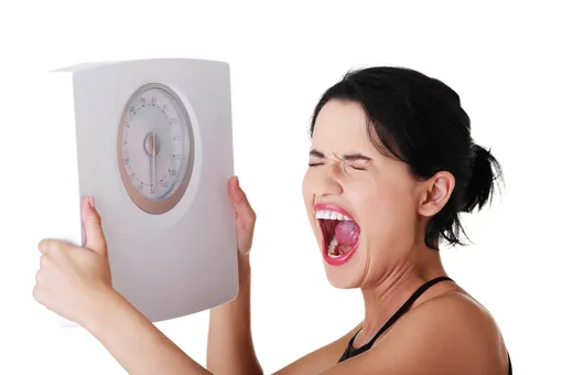 Набрать вес перед «критическими днями»: нормально ли это?