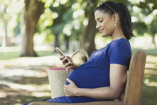 Могу и два груза: беременная на шестом месяце поднимает штангу в 102 кг (видео)