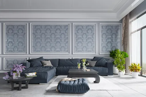 Современный дизайн интерьера гостиной в серых тонах с угольно-серыми диванами