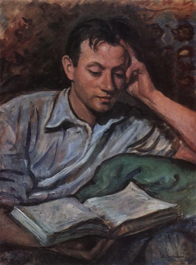 Александр Серебряков за чтением книги