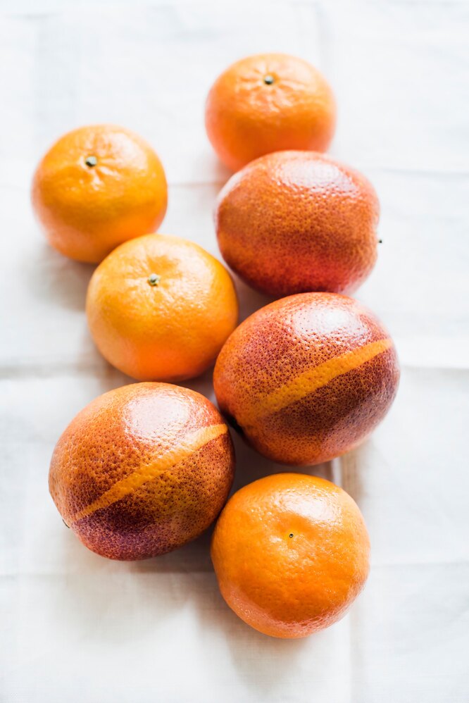 Красные апельсины и мандарины помогают сжигать жир на животе