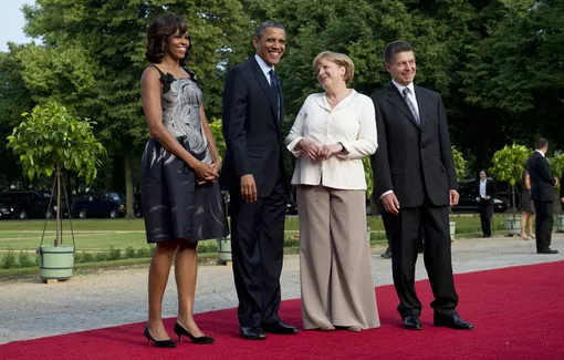 Ангела Меркель на встрече с четой Обама в брюках, которые не понравились Лагерфельду