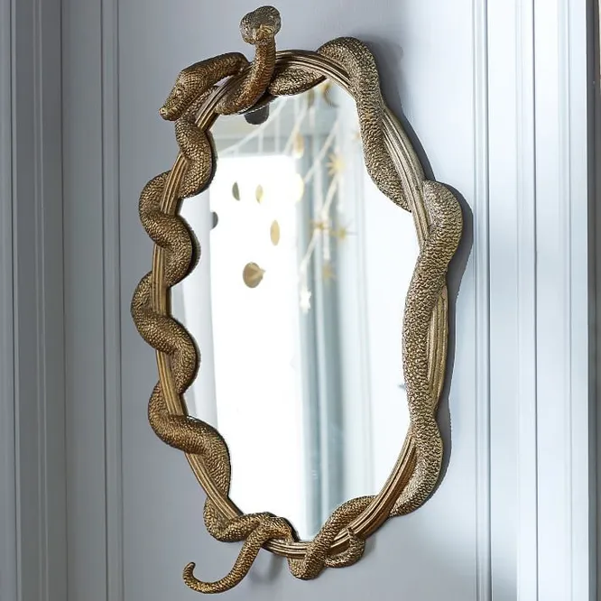 Зеркало со змеиным элементом