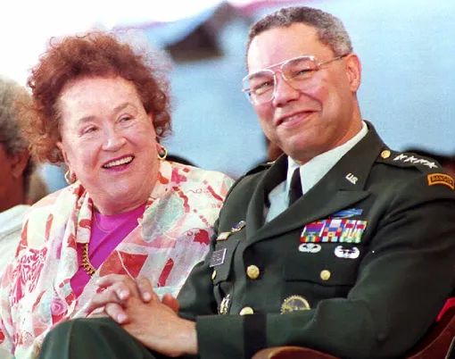 General Colin L. Powell, Chairman of the Joint Chiefs of Staff, laughs with chef Julia Child during the Harvard University Graduation where they received Honorary degrees 10 Jun. Powell was geered by some of the students for his position banning homosexuals in the military