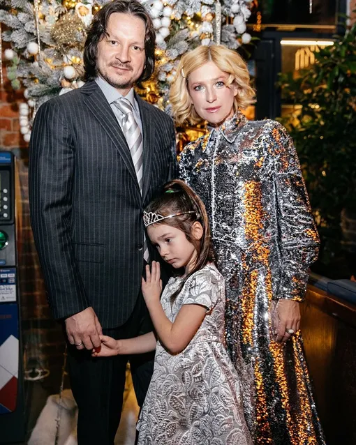 Ирина Гринева с мужем и дочерью