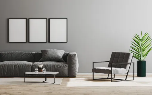 Современный интерьер гостиной в серых тонах и серо-чёрной мягкой мебелью